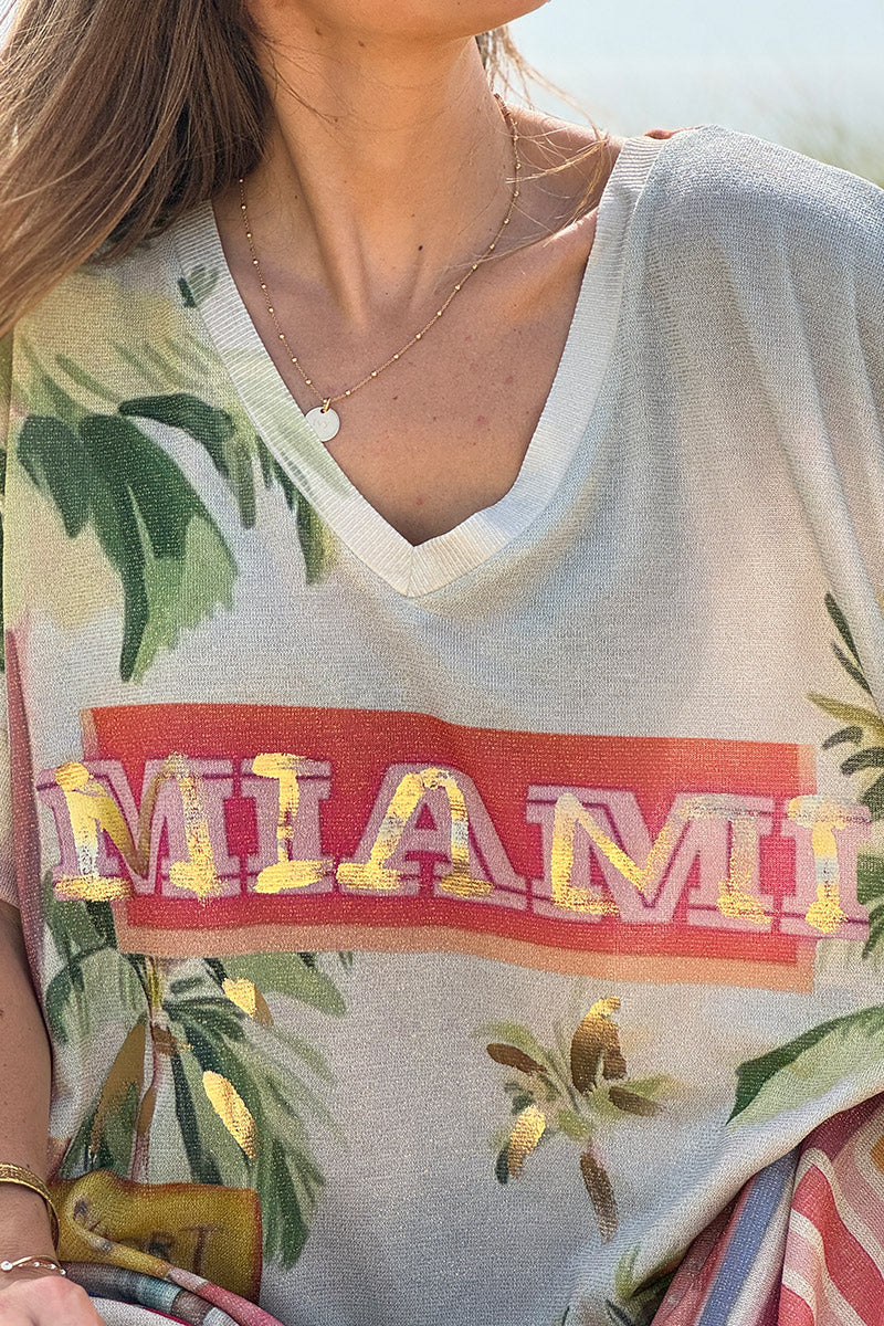 Trinidad - Vestido largo, brillante y de pernera ancha con un colorido estampado de palmeras de Miami