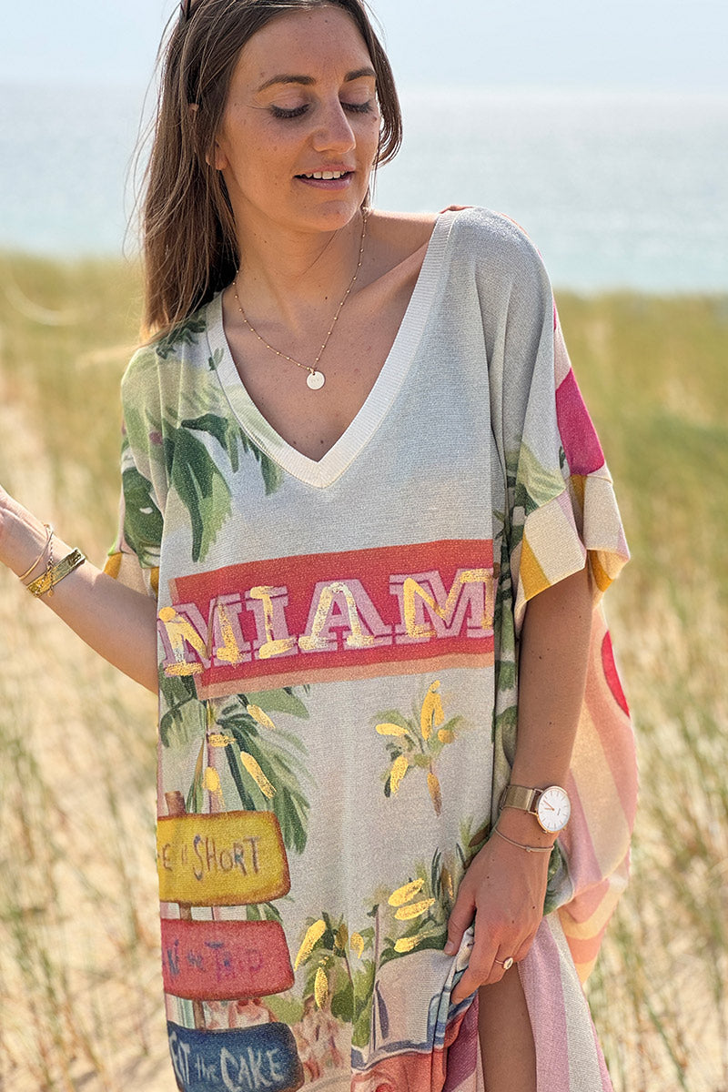 Trinidad - Vestido largo, brillante y de pernera ancha con un colorido estampado de palmeras de Miami