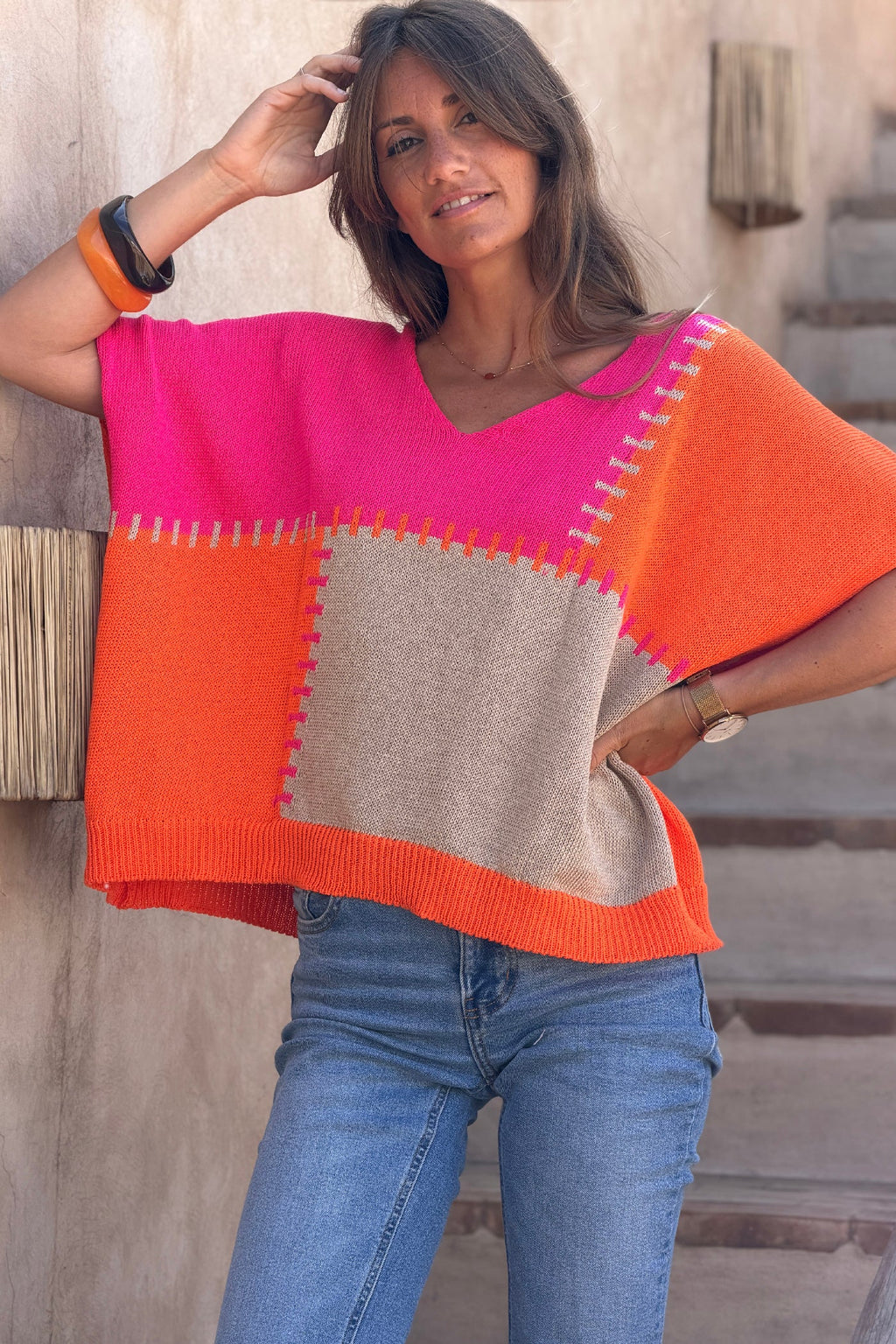 Lidia - Suéter holgado de punto de algodón con diseño de patchwork en naranja y fucsia