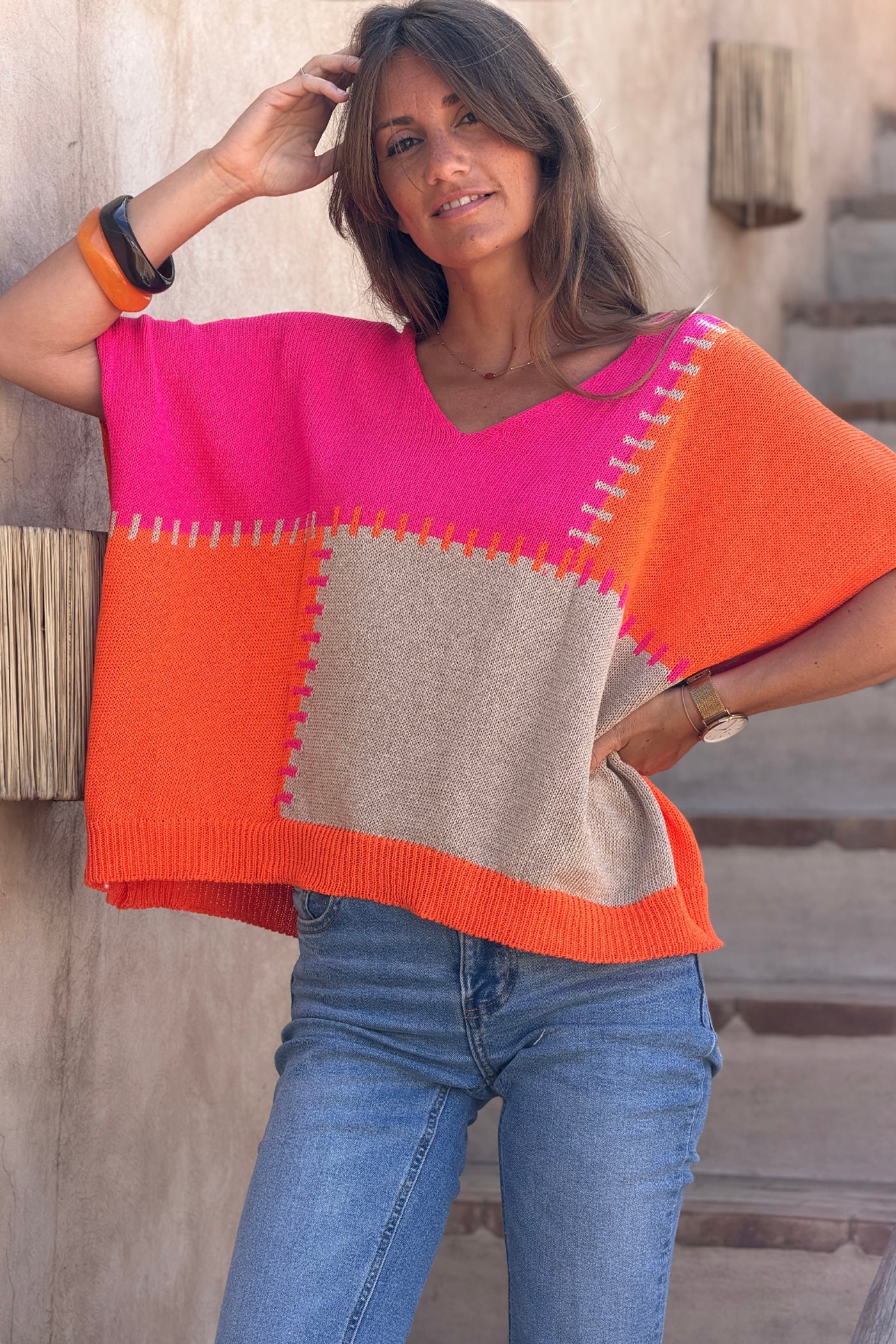 Lidia - Suéter holgado de punto de algodón con diseño de patchwork en naranja y fucsia
